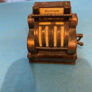 Miniature metal cash register and sewing machine